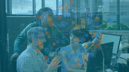 Canvas Print - Animation of network of digital icons over diverse colleagues discussing together at office