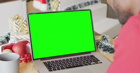 Poster - African american man using laptop for video call with copy space