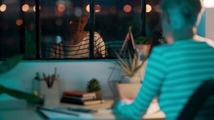 Aufkleber - Web designer, senior and woman working late in a graphic design agency to plan a homepage. Night, design agency and creative multimedia designer working overtime to meet app design deadline