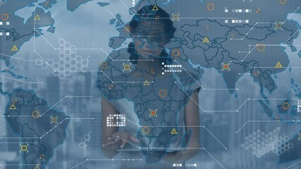 Wall Mural - Animation of world map and data processing over african american businesswoman using tablet