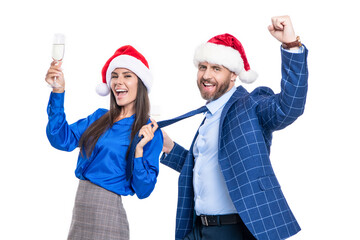 Wall Mural - laughing business couple celebrate new year isolated on white. corporate new year party