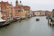 Grand Canal in Venice with only a vaporetto without people during the lockdown