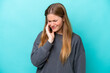 © luismolinero - Young caucasian woman isolated on blue background with toothache