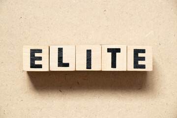 alphabet letter block in word elite on wood background