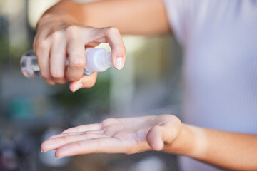 Woman, hands and sanitize for healthcare hygiene or virus disinfectant, covid safety and cleaning bacteria. Spray bottle, clean hand and antibacterial or health compliance with alcohol hand sanitizer