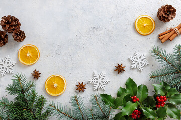 Wall Mural - christmas decorations with holly berries and tree branches.