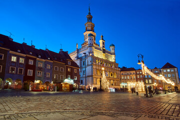 Wall Mural - historic tenement houses and the renaissance town hall with Christmas decorations on the market square at night