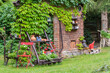 Colorful summer garden with ornaments