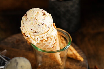 Butter pecan ice cream in waffle cones