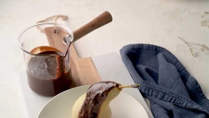 Canvas Print - Poire belle Helene - French dessert made from poached pears served with chocolate ganache.