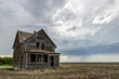 © Designpics - Old farmstead on the prairies under storm clouds; Val Marie, Alberta, Canada