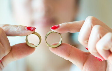 Wedding rings in woman hand.