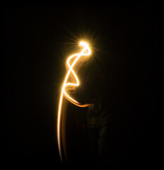 Poster - Beautiful orange light effect on black background.