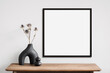 Leinwandbild Motiv Empty square frame mockup in modern minimalist interior with plant in trendy vase on white wall background, Template for artwork, painting, photo or poster