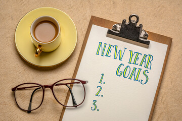 Canvas Print - new year goals list - handwriting in a clipboard, flat lay with a cup of coffee and glasses, goal se
