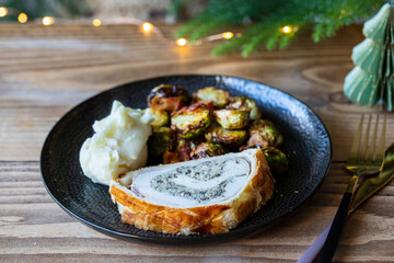 Canvas Print - Christmas dinner with chicken Wellington, mash potatoes and roasted brussel sprouts