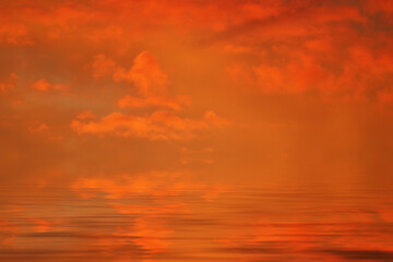 Poster - sea water surface with scarlet clouds at sunset