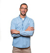 © agongallud - Satisfied young man with crossed arms gesture
