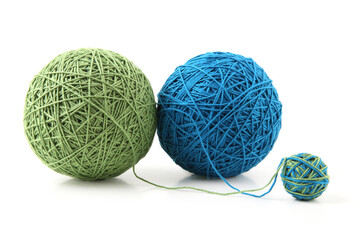 Wall Mural - two big thread green blue balls and one small mix ball isolated on white background. balls of natura
