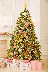 Wall Mural - A large beautiful traditional Christmas tree with gifts in a classic interior.