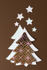 Sticker - stylized paper holiday trees and stars on brown