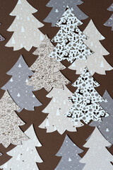 Wall Mural - set of stylized paper holiday trees on dark brown paper