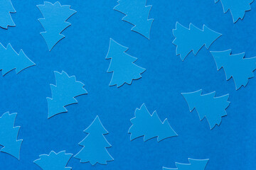 Sticker - stylized blue paper holiday trees on blue paper