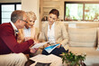 © Alexandra/peopleimages.com - Its time to enjoy the fruits of our labor. Shot of a senior couple getting advice from their financial consultant.