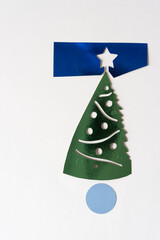 Sticker - stylized retro tree and star cutouts on blank paper