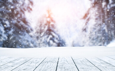 Wall Mural - winter christmas scenic background with wooden table and copy space.
