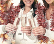 © yurolaitsalbert - closeup.three young women with glasses of champagne. Beautiful bokeh effect from a garland.
