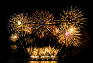 Firework display on isolated black background at Pattaya City. 