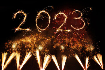 Wall Mural - 2023 Happy New Year written with Sparkler firework on black background