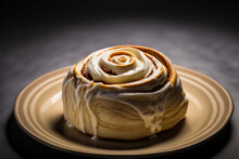 Closeup View Of A Homemade Baked Cinnamon Roll With Vanilla Icing