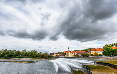 Wall Mural - River view on Landberg-am-Lech town, Germany on a cloudy autumn day