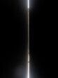 © Krisztian - Bright white light coming through a narrow gap.