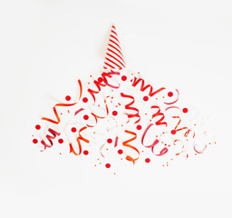 Wall Mural - striped birthday hat with confetti on white background