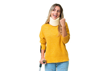 Sticker - Young Uruguayan woman wearing neck brace and crutches over isolated background celebrating a victory