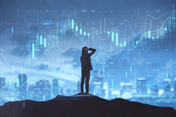 Canvas Print - Back view of backlit woman looking at glowing business forex chart hologram and grid on blurry night city background. Trade, stock, finance and invest concept. Double exposure.