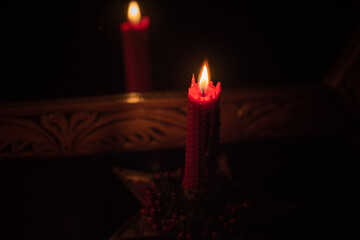 Wall Mural - Fortune-telling cards and burning candles on a table on mystic background 