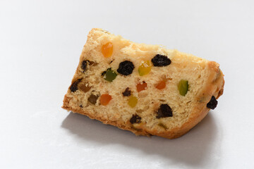 Wall Mural - slice of panettone on a white background