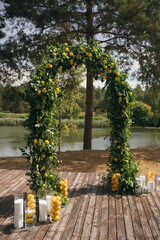 Wall Mural - Ceremony area. Wedding arch. A significant summer day.