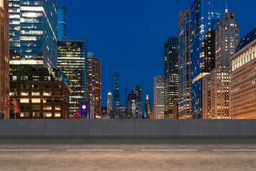 Empty urban asphalt road exterior with city buildings background. New modern highway concrete construction. Concept of way to success. Transportation logistic industry fast delivery. Chicago. USA.