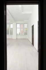 Sticker - Modern office room with windows and door, view from entrance. Interior design