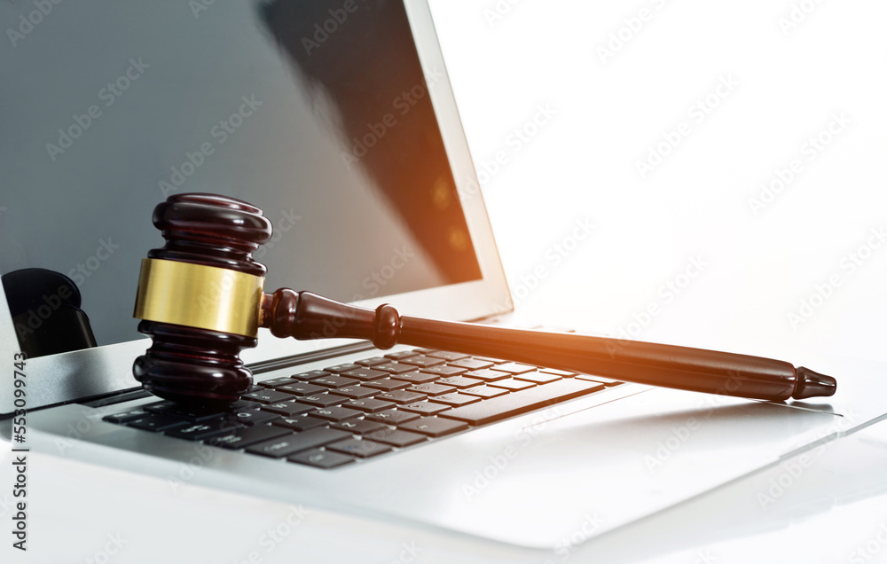 Judge gavel on laptop computer keyboard Stock Photo | Adobe Stock