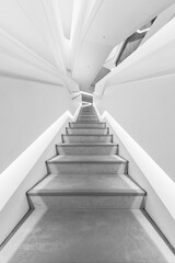Poster - empty futuristic stairway in modern building. Architectural abstract background