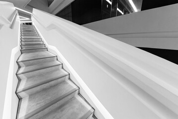 Poster - empty futuristic stairway in modern building. Architectural abstract background