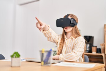 Wall Mural - Young blonde woman business worker using virtual reality goggles at office