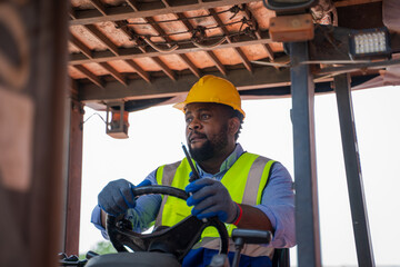 Poster - Foreman working at container stock yard with drive a loader forklift steering wheel control for transport handling.