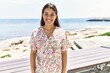 © Krakenimages.com - Young latin woman smiling confident standing at seaside